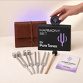 Pure Tones Harmony Set with black packaging, four tuning forks, carry case, mallet, activator and user guide